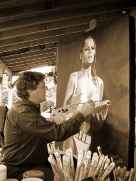 Featured is a photo of the Belgian portrait artist, Peter Engels at work at his easel ... his specialty:  "vintage style" portraits.  Photo used courtesy of Peter Engels and the Creative Commons Attribution 3.0 Unported License. (http://commons.wikimedia.org/wiki/File:Peter_Engels_portrait_painter_portretschilder.jpg)